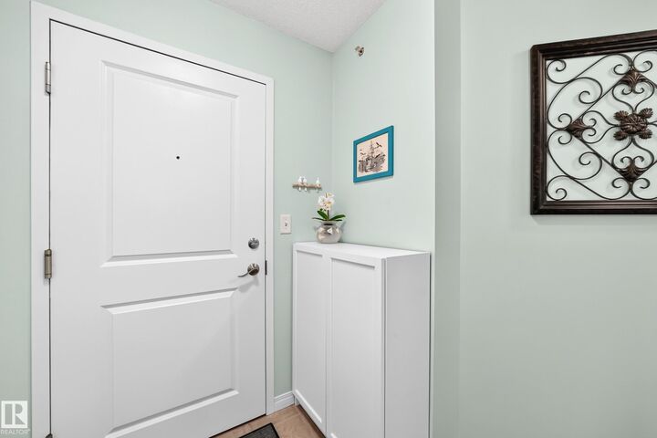 Property Photo:  11449 Ellerslie Road SW 401  AB T6W 1T2 
