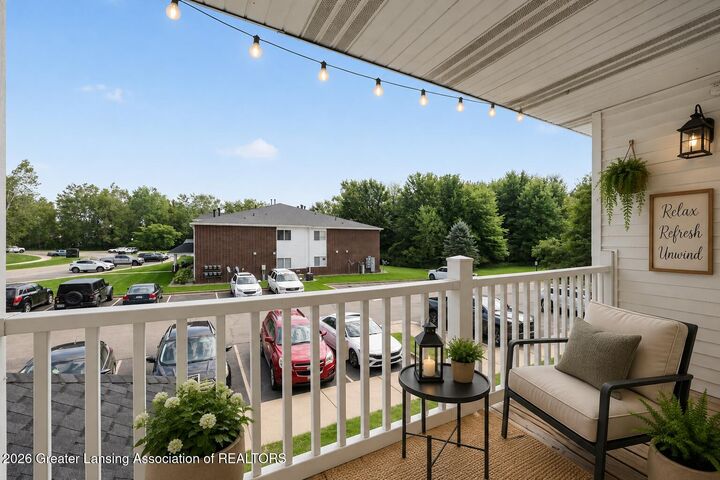 Property Photo:  813 Carom Circle  MI 48854 