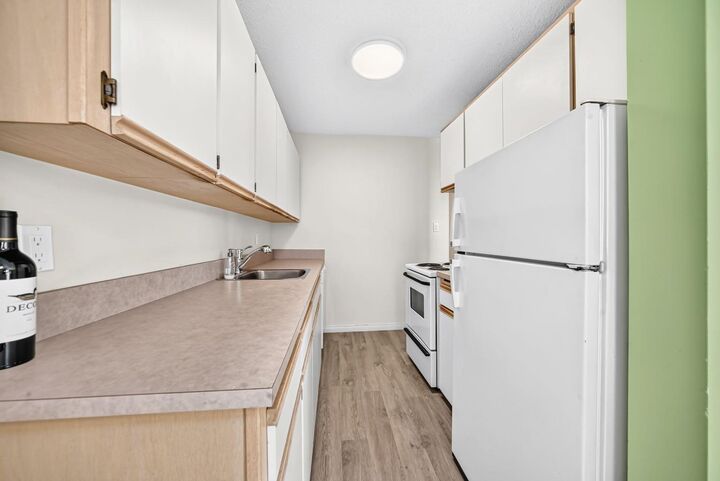 Property Photo:  1421 7 Avenue NW 232  AB T2N 0Z3 