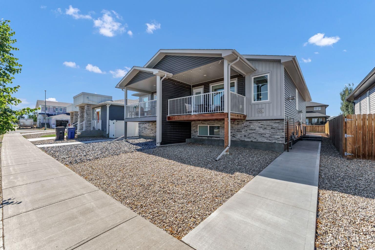 Property Photo:  122 Somerside Road SE  AB T1B 0N3 