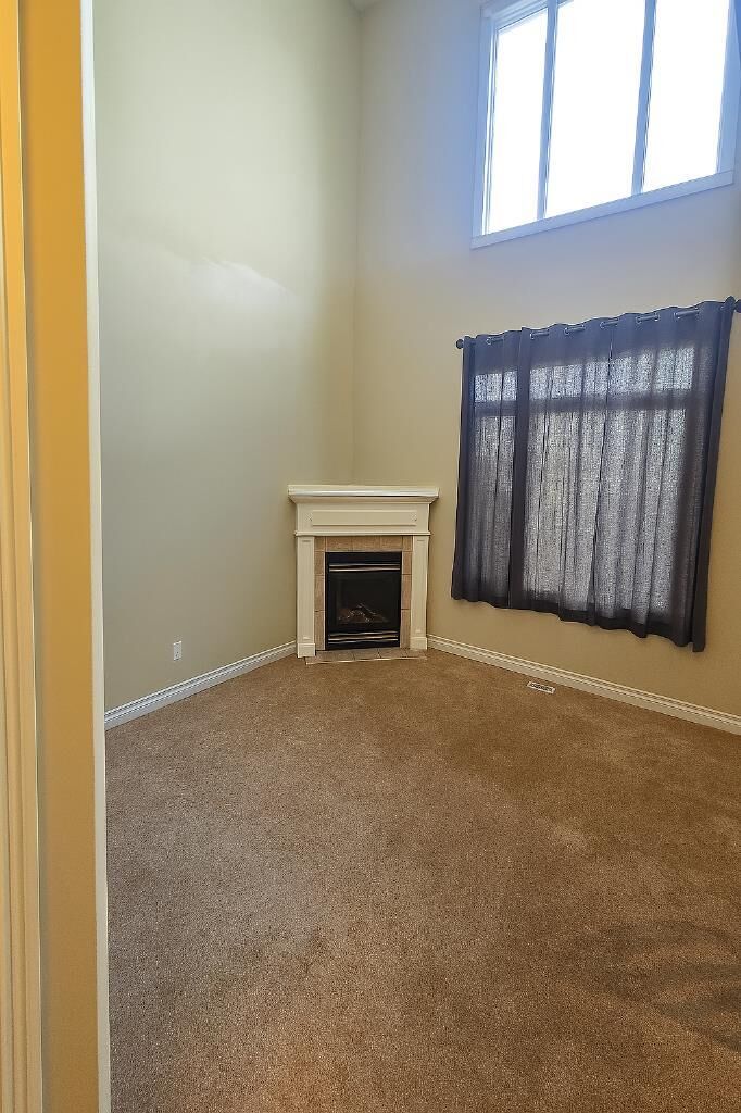 Property Photo:  11338 82 Avenue  AB T8W 0A7 