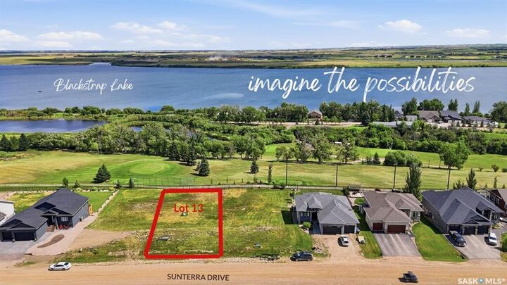 Property Photo:  13 Sunterra Drive  SK S7C 0A3 