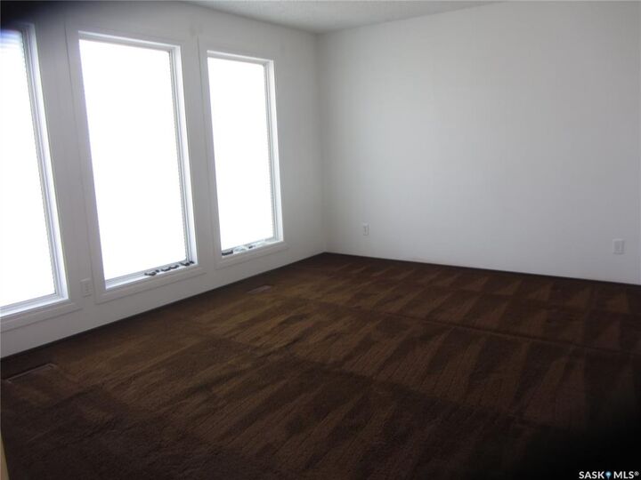Property Photo:  603 Christopher Way  SK S7J 3S3 