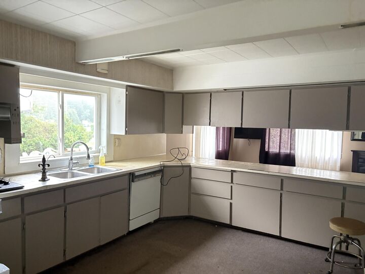 Property Photo:  1022 Long Rapids Road  MI 49707 