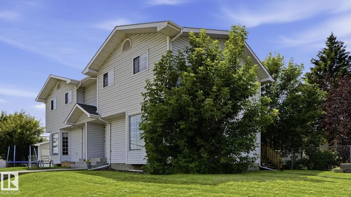 Property Photo:  8230 71 Street NW  AB T6B 1X2 