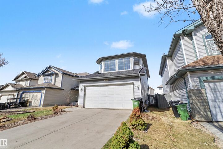 Property Photo:  4712 201 St NW  AB T6M 2X7 