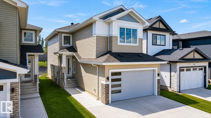 Property Photo:  65 Silverstone Drive  AB T7Z 0E8 