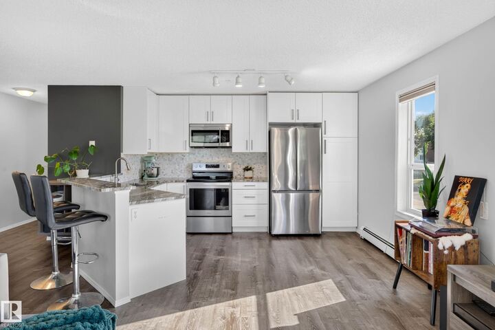 Property Photo:  11104 109 Avenue NW 204  AB T5H 1E1 