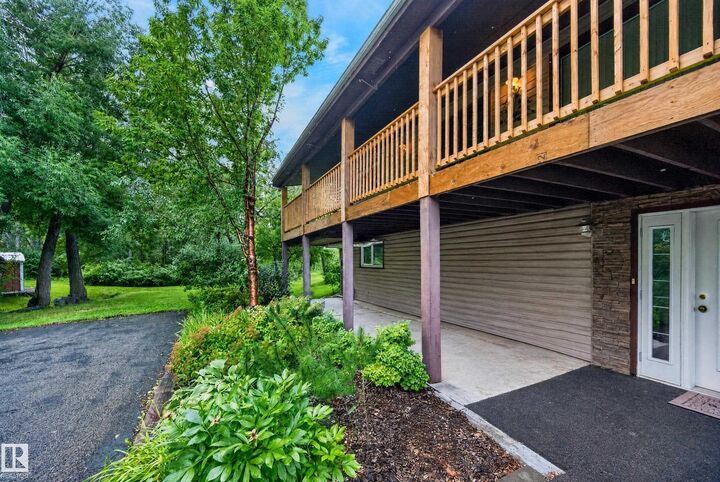 Property Photo: 52063 Rge Road 225 206 AB T8C 1C3