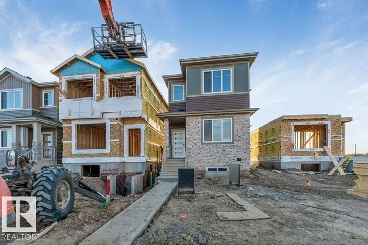 Property Photo:  8412 226 Street NW  AB T5T 7Y8 