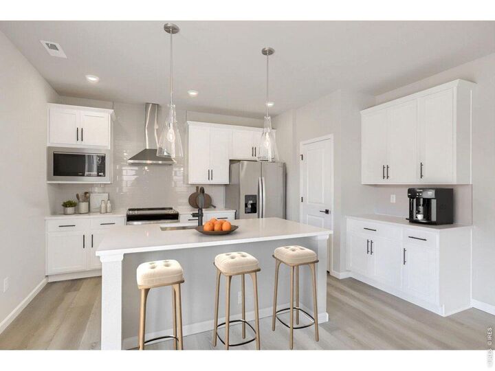 Property Photo:  678 Noola St  CO 80550 