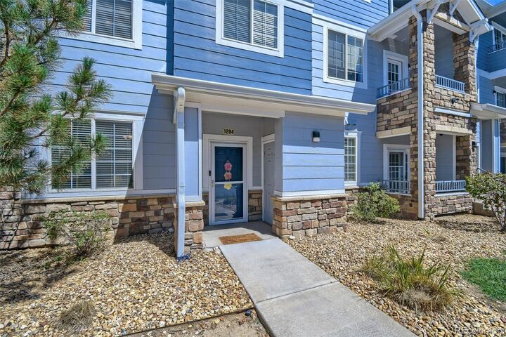 Property Photo:  5255 Memphis Street 1204  CO 80239 