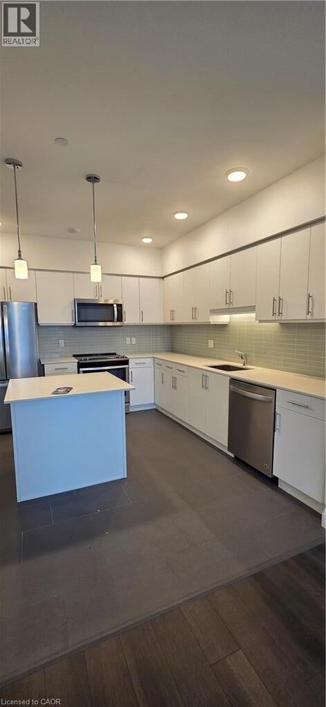 Property Photo:  399 Queen Street South 304  ON N2G 1W6 