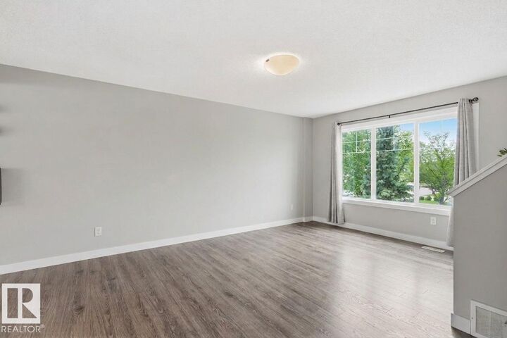 Property Photo:  1391 Starling Drive NW 12  AB T5V 1T7 