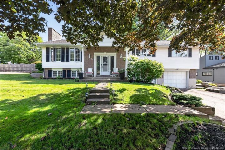 Property Photo: 56 Fairway Boulevard NB E1B 1T3