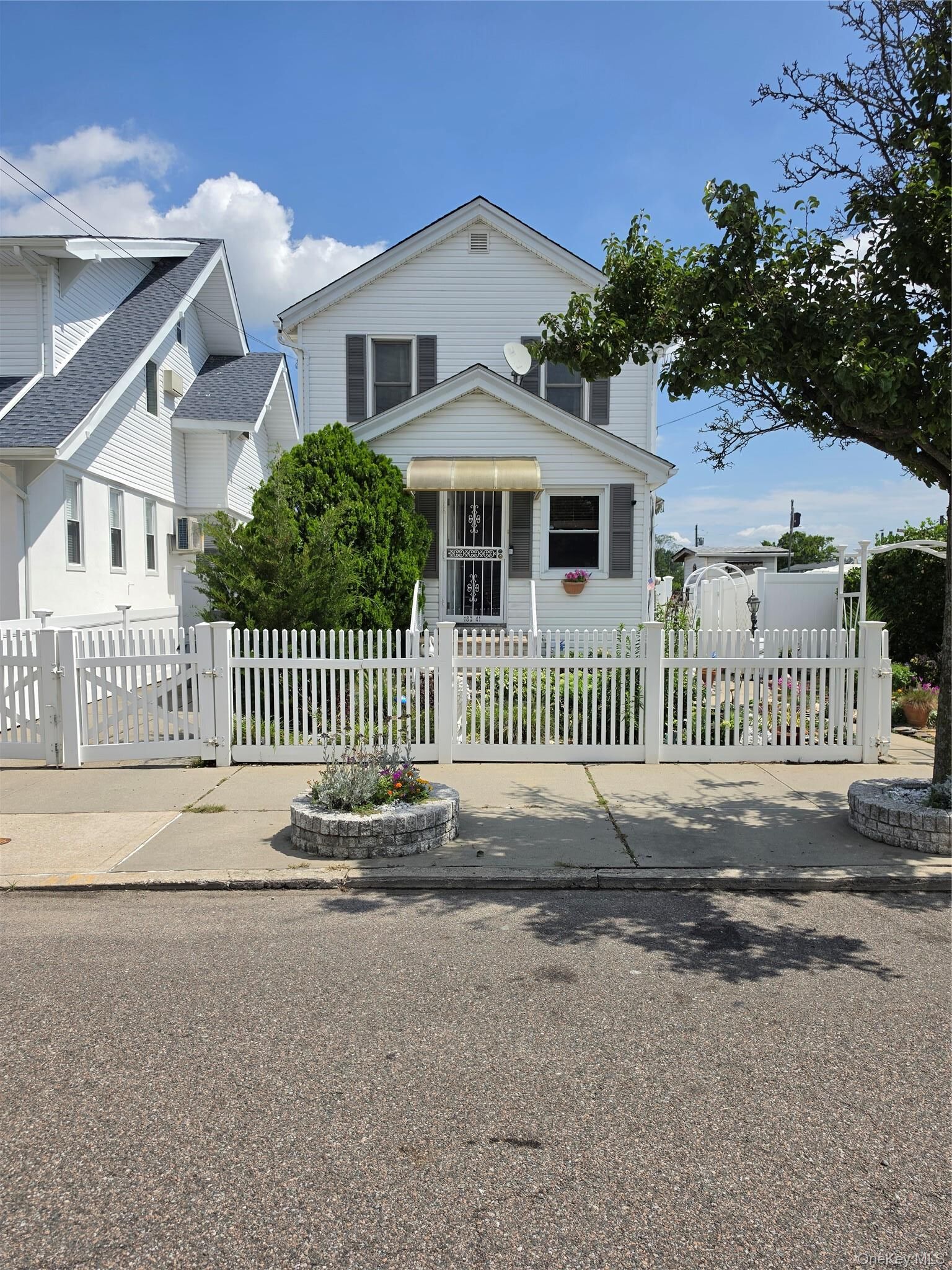 Property Photo:  160-41 99th Street  NY 11414 