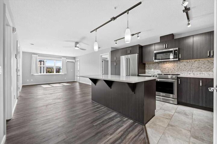 Property Photo:  10 Market Boulevard SE 2308  AB T4A 0W8 