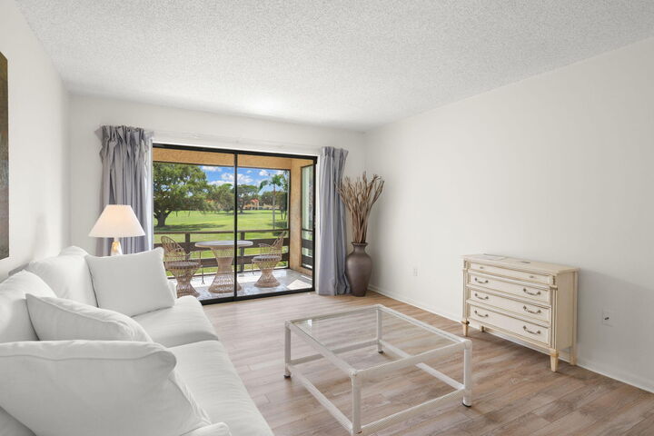 Property Photo:  5423 SE Miles Grant Road SE F-203  FL 34997 