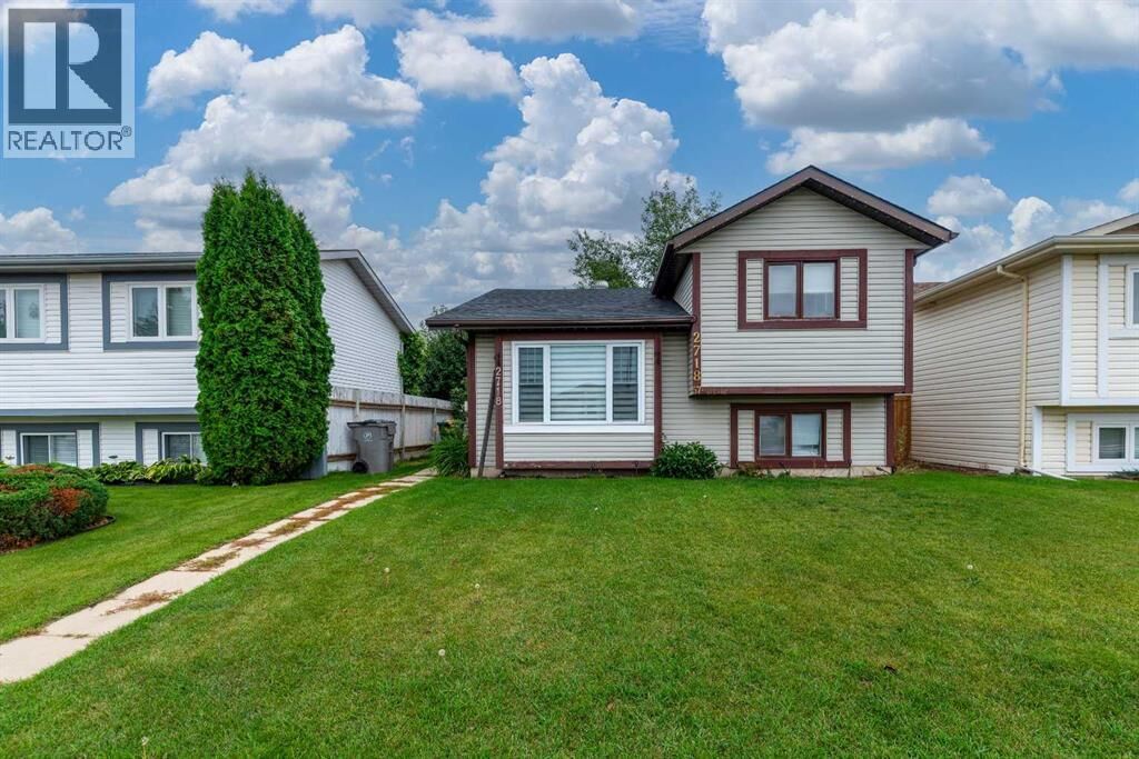 Property Photo:  2718 57A Avenue  AB T9V 2N2 