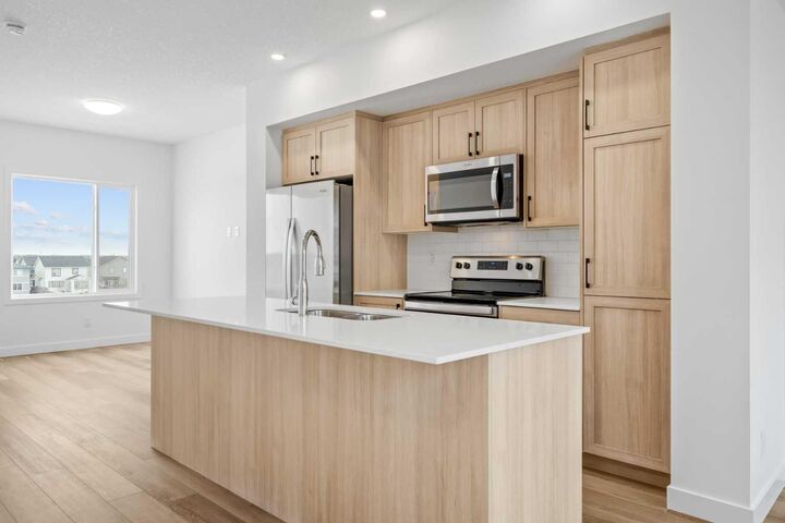 Property Photo: 25 Wildwoods Court SW 1306 AB T4B 5V7