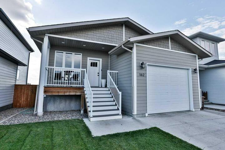 Property Photo:  162 Prairie Gold Street  AB T1G 0G3 