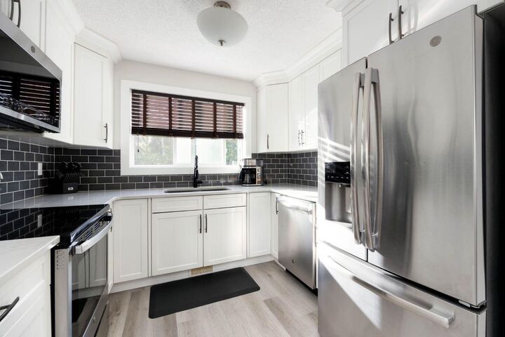 Property Photo:  1041 Timberline Drive  AB T9K 1A8 