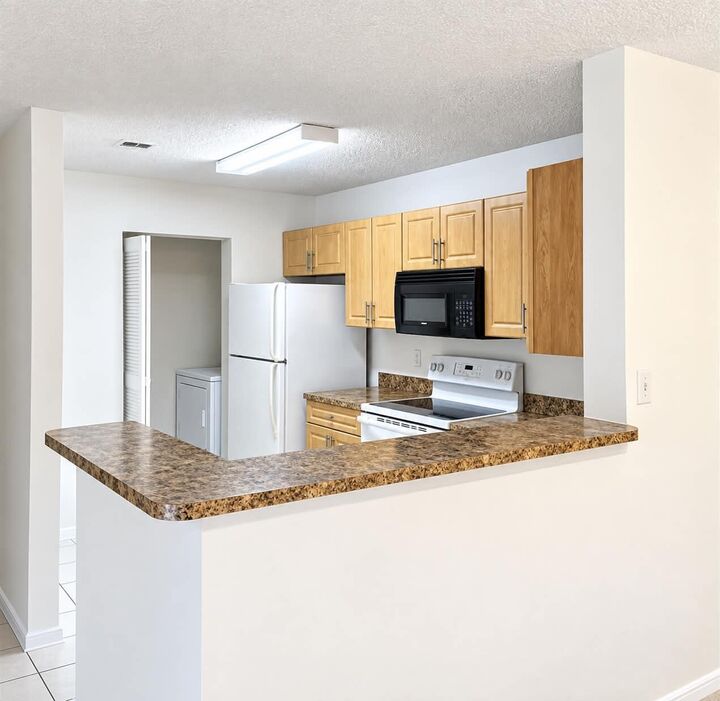 Property Photo:  11205 W Atlantic Boulevard 107  FL 33071 
