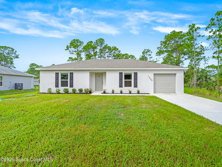 Property Photo: 1094 Harlingen Road SW FL 32908