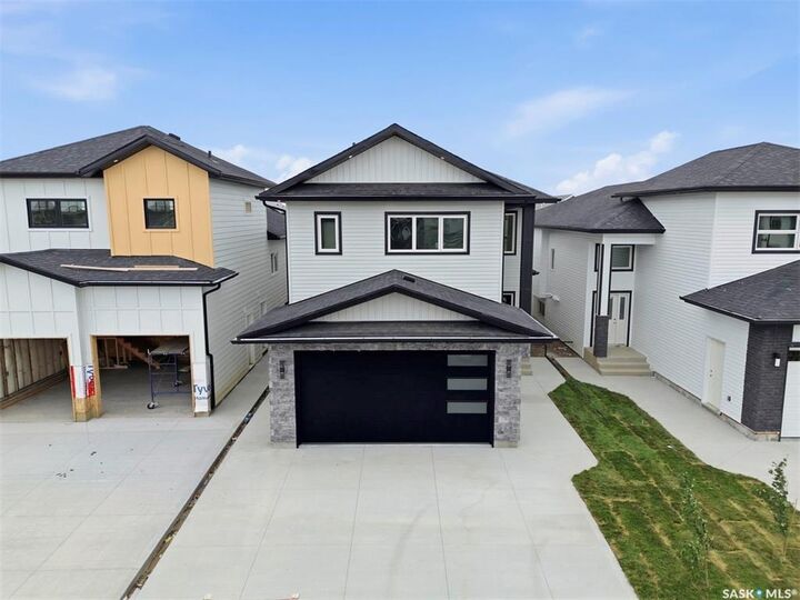 Property Photo: 1215 Nightingale Terrace SK S7L 7R6