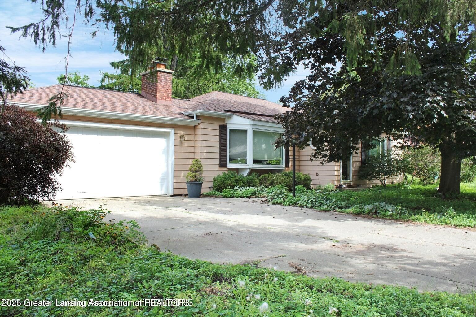 Property Photo:  1615 Ridgewood Drive  MI 48823 