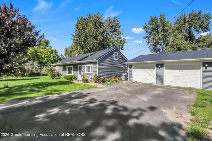 Property Photo: 116 E Coats Grove Road MI 49058