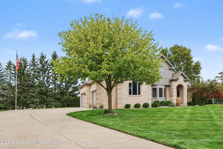Property Photo:  910 Sandhill Drive  MI 48820 