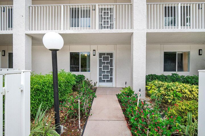 Property Photo: 6112 Huntwick Terrace 102 FL 33484
