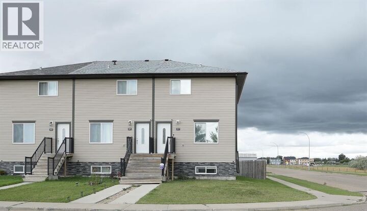 Property Photo:  347 17 Street East  AB T1R 0Z6 