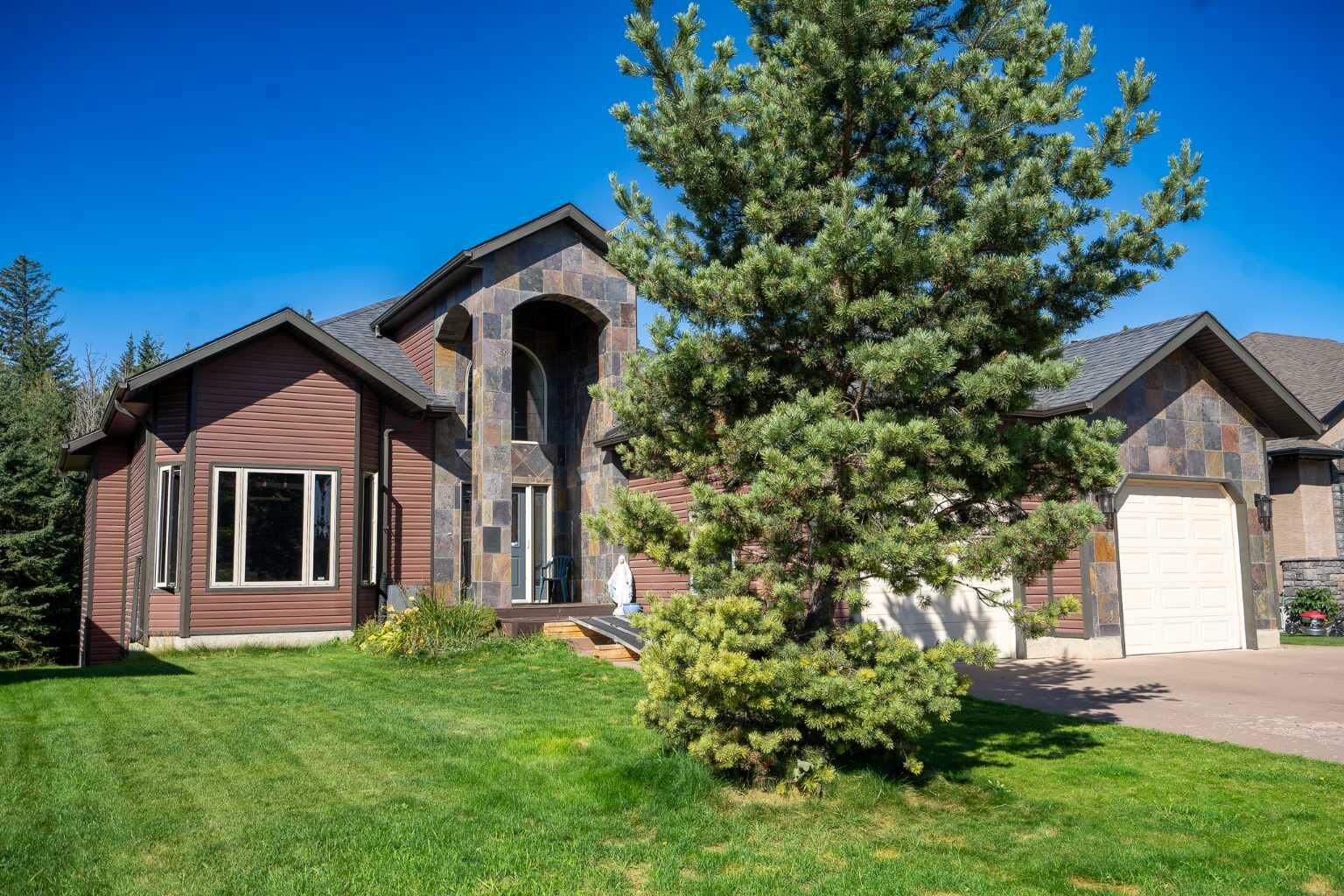 Property Photo:  7402 61 Street  AB T4T 0A3 