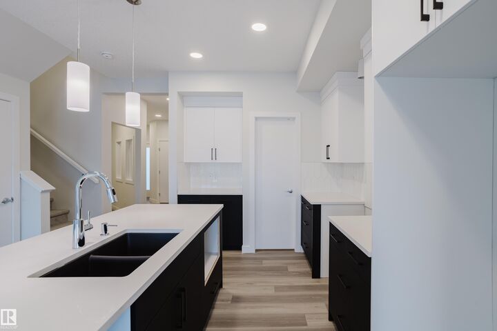 Property Photo: 18647 19 Avenue NW AB T6M 3M9