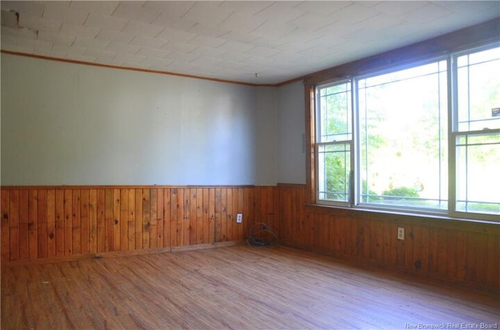 Property Photo:  20 Riverside Drive  NB E3L 1S5 