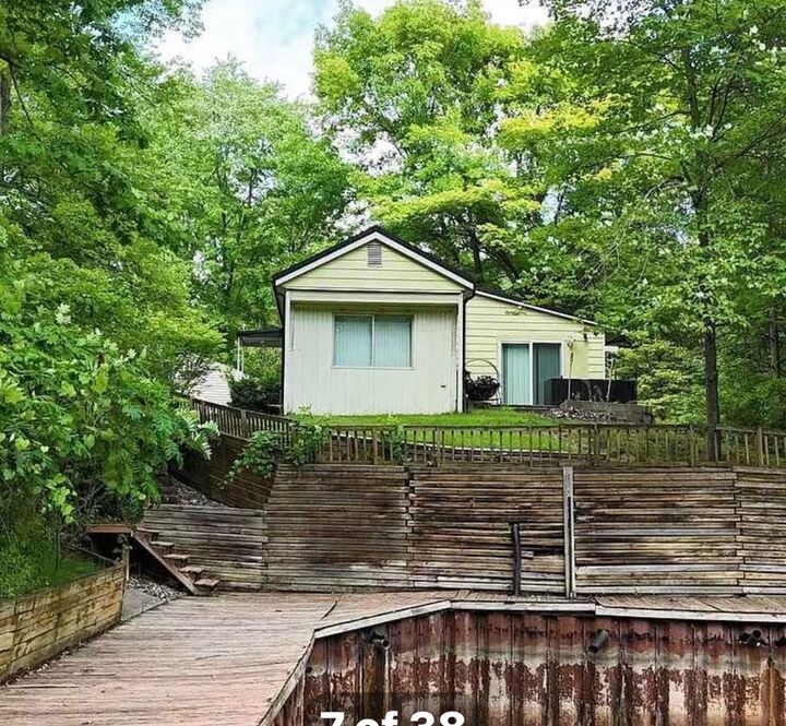 Property Photo:  836 Poquonnock Drive  MI 48628 