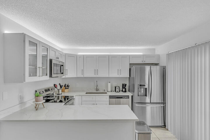 Property Photo: 2228 White Pine Circle A FL 33415