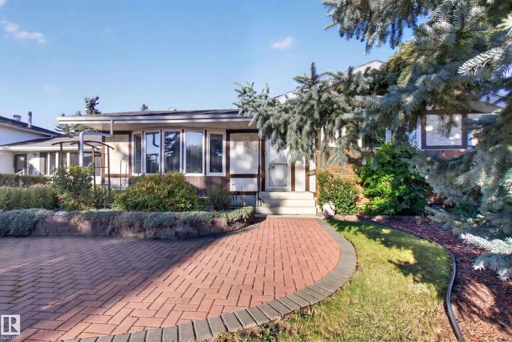 Property Photo:  3918 103B Street NW  AB T6J 2X9 