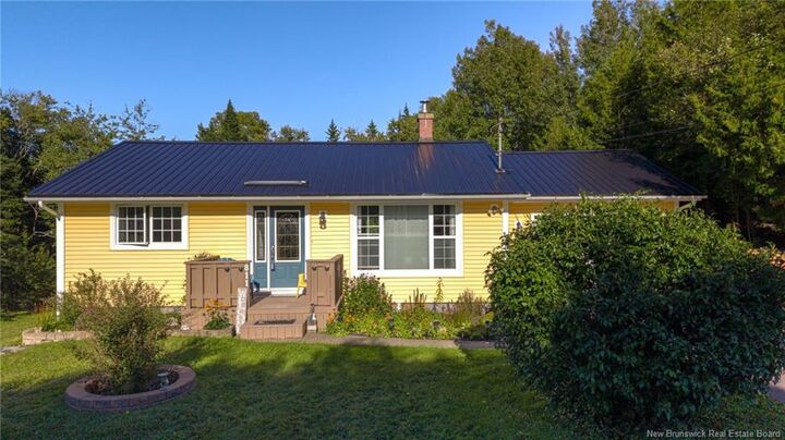 Property Photo:  811 Lorneville Road  NB E2M 7E5 
