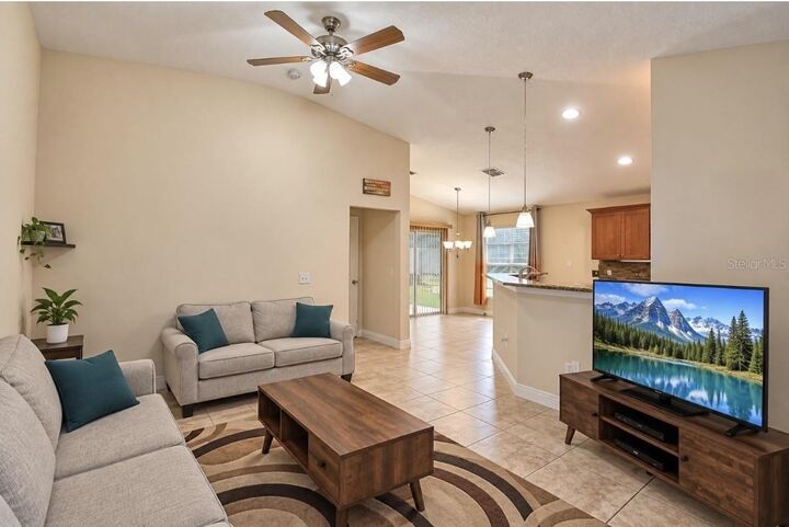 Property Photo: 2128 Orchid Way FL 34759