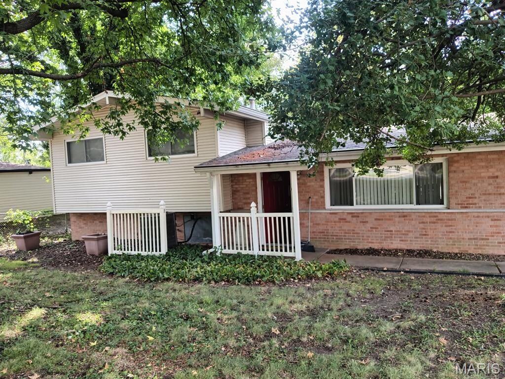 Property Photo:  9046 Old Bonhomme Road  MO 63132 