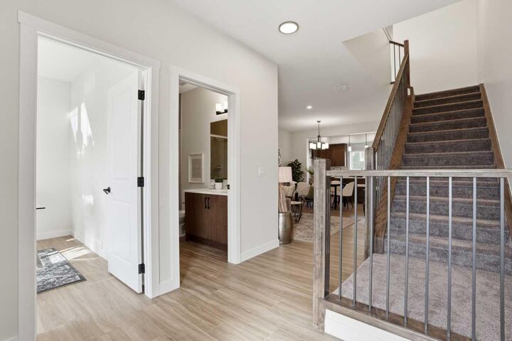 Property Photo:  96 Buffaloberry Manor SE  AB T3M 4H4 