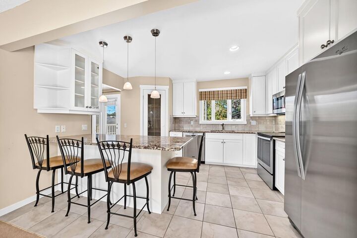Property Photo:  206 Huntham Place NE  AB T2K 4G6 