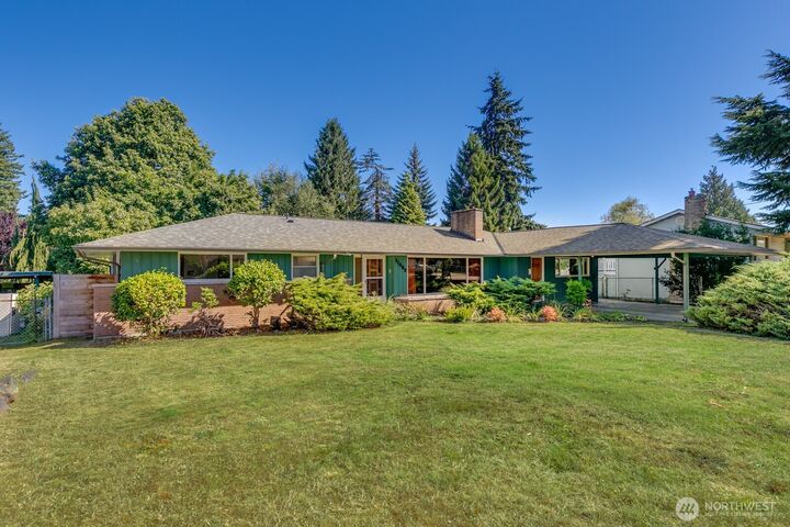 Property Photo:  11303  1st Place W  WA 98204 