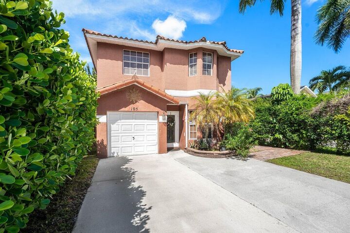 Property Photo:  105 Plumage Lane  FL 33415 