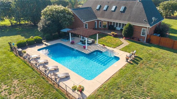 Property Photo:  1473 Altamahaw Union Ridge Road  NC 27217 