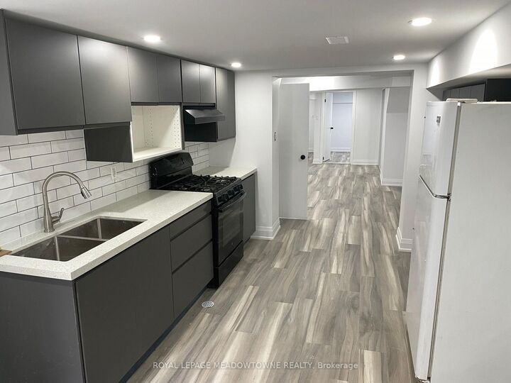 Property Photo:  1211 College Street Bsmt  ON M6H 1C1 