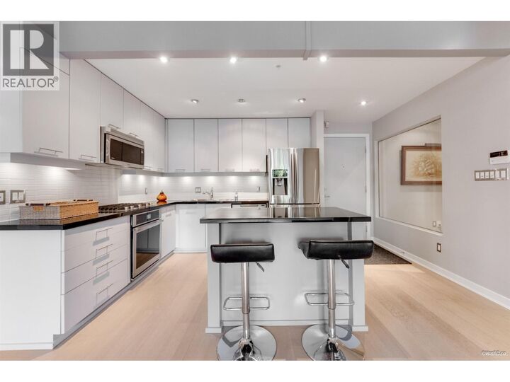 Property Photo: 530 Raven Woods Drive 210 BC V7G 2T5